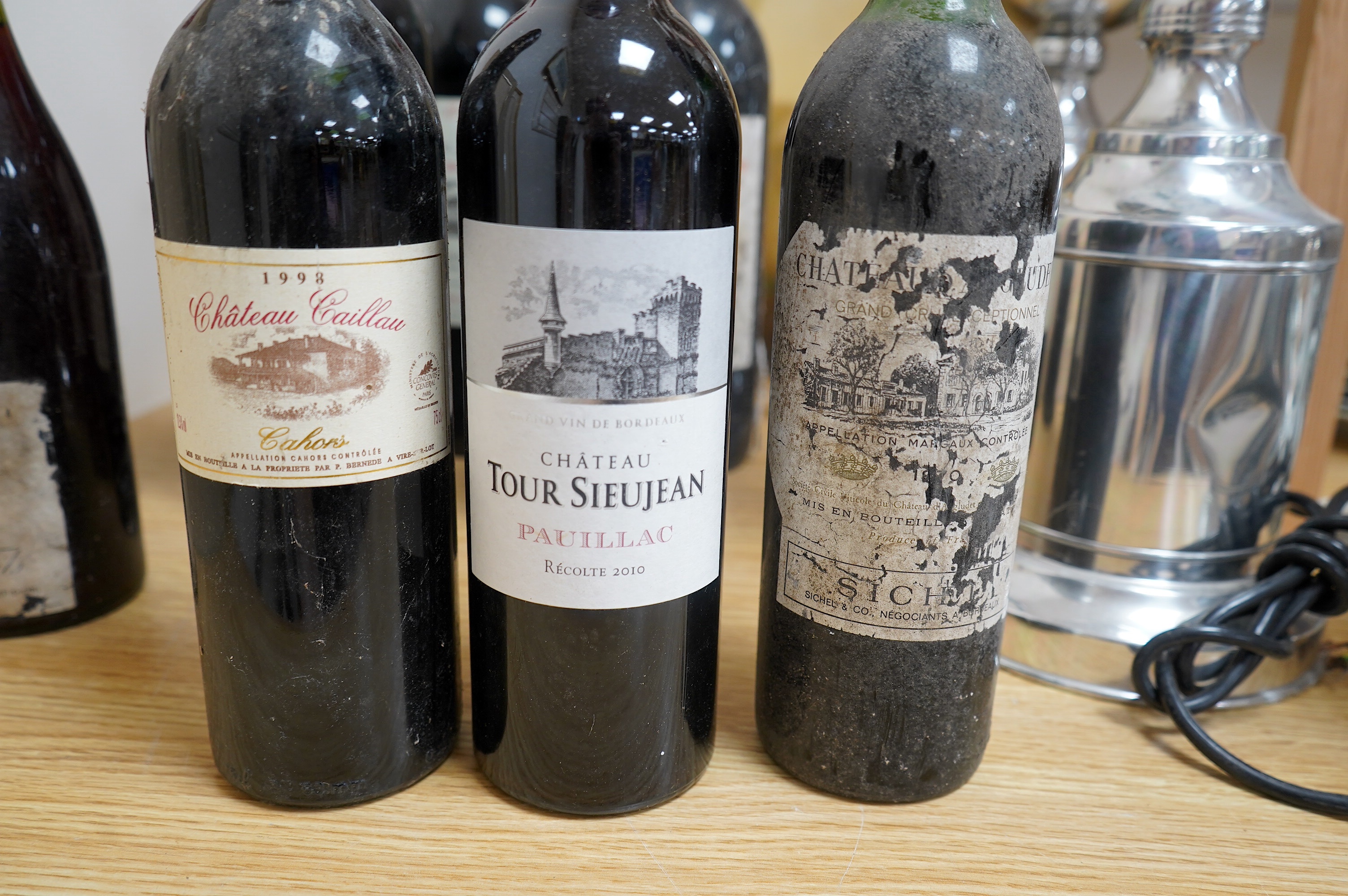 Eight bottles of French wine to include two bottles of Chateau Tour Sieujean 2010, one bottle of Chateau Saint Pierre 1978 and two bottles of Chateau Lescalle 2008. Condition - good, storage history unknown